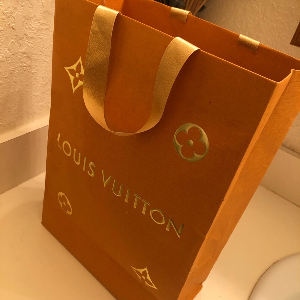 Louis Vitton shopping bag.